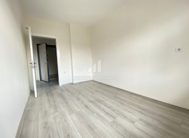 Квартира с тремя спальнями, 135м², с чистовой отделкой, в новой резиденции в Эрдемли, Мерсин ID-11558 фото-11