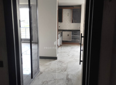 Two bedroom apartment, 120m², in a cozy residence with a swimming pool in the Tomyuk area, Mersin ID-11577 фото-5