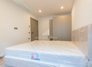 Новая квартира с одной спальней, укомплектованная мебелью и техникой, Гюзельоба, Анталья, 55 м2 ID-11586 фото-4