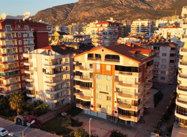 One-bedroom apartment 70 m2, with a designer interior, on the first coastline and sea views in Mahmutlar, Alanya ID-11604 фото-3