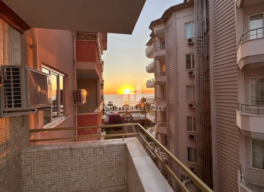 Двухкомнатная квартира 70 м2, с дизайнерским интерьером, на первой береговой линии и видом на море в Махмутларе, Аланья ID-11604 фото-4