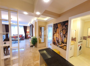 Стильная двухкомнатная квартира 80 м2, с авторским интерьером и роскошной мебелью в Джикджилли, Аланья ID-11606 фото-4
