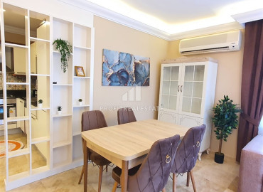 Стильная двухкомнатная квартира 80 м2, с авторским интерьером и роскошной мебелью в Джикджилли, Аланья ID-11606 фото-17