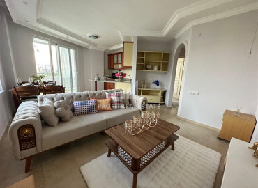 Уютная меблированная двухкомнатная квартира 55 м2, с застекленным балконом, в 350 метрах от пляжа, в Тосмуре, Аланья ID-11034 фото-1