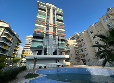 Стильная трехкомнатная квартира с мебелью, 120 м2, с застекленным балконом, в 400 метрах от моря в Махмутларе, Аланья ID-11692 фото-1