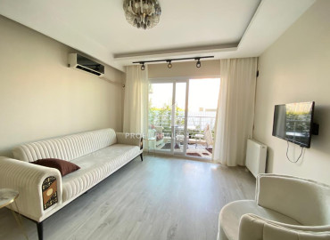 Квартира с одной спальней, 55м², с мебелью и бытовой техникой, в 350м от моря в районе Мерсина Мезитли ID-11754 фото-1