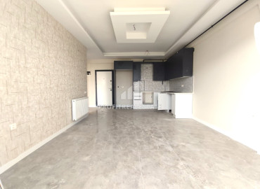 Новая квартира с одной спальней, 55м², в резиденции с хорошей инфраструктурой в Мезитли, Мерсин ID-11767 фото-3