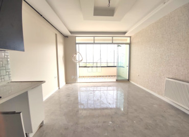 New one-bedroom apartment, 55m², in a well-equipped residence in Mezitli, Mersin ID-11767 фото-7