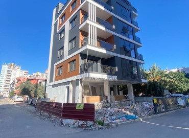 Новая двухкомнатная квартира, 50м², в доме городского типа в центре Мезитли, Мерсин ID-11793 фото-1