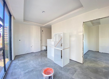 Новая двухкомнатная квартира, 50м², в доме городского типа в центре Мезитли, Мерсин ID-11793 фото-4