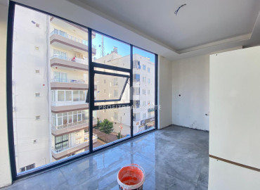 Новая двухкомнатная квартира, 50м², в доме городского типа в центре Мезитли, Мерсин ID-11793 фото-6