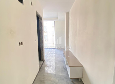 Новая двухкомнатная квартира, 50м², в доме городского типа в центре Мезитли, Мерсин ID-11793 фото-8