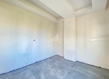 Новая двухкомнатная квартира, 50м², в доме городского типа в центре Мезитли, Мерсин ID-11793 фото-10