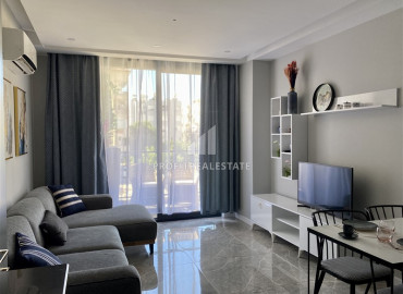 Luxury one-bedroom apartment with a designer interior, 150 meters from the sea in the center of Alanya ID-11826 фото-3