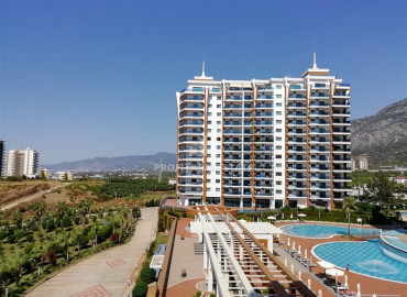 Furnished apartment 2 + 1, 100m², in a luxury residence at the foot of the Taurus Mountains in Mahmutlar ID-11864 фото-2