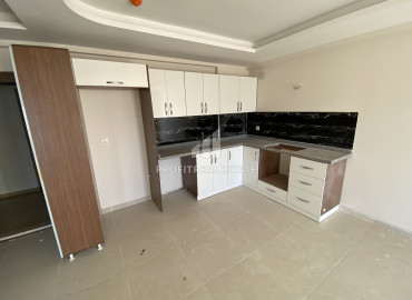 Spacious apartment 1 + 1, 65m², in Arpacbakhshish, in the district center of Erdemli, 200m from the sea ID-11872 фото-2