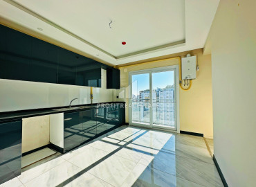 Трехкомнатные апартаменты, 115м², с отдельной кухней и видом на море в районе Акдениз (Мезитли), Мерсин ID-11875 фото-4