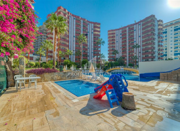 Large two bedroom apartment, 120m², on the central street of Mahmutlar, Alanya, with a view of the sea and mountains ID-11930 фото-1