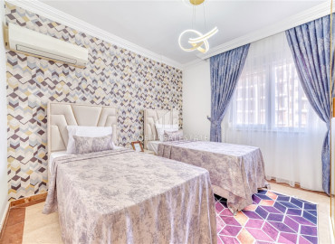 Large two bedroom apartment, 120m², on the central street of Mahmutlar, Alanya, with a view of the sea and mountains ID-11930 фото-11