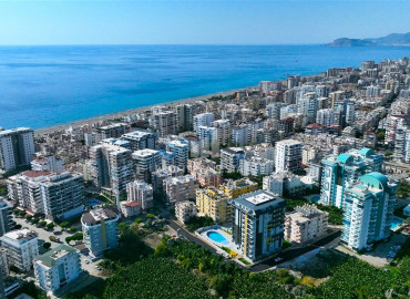 Three bedroom apartment, 120m², in a new residence not far from the sea in Mahmutlar, Alanya ID-11947 фото-2