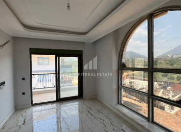 New one-bedroom apartment, 53m², with mountain views in a premium residence in Oba district of Alanya ID-11996 фото-4