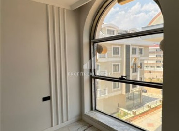 New one-bedroom apartment, 53m², with mountain views in a premium residence in Oba district of Alanya ID-11996 фото-12