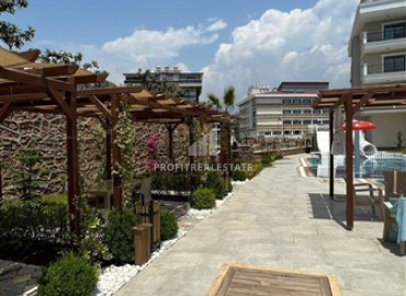 New one bedroom apartment, unfurnished, in the prestigious Oba area, Alanya, 71 m2 ID-12014 фото-17