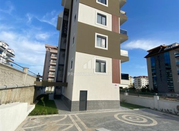 Компактная двухкомнатная квартира, 50м², в новой резиденции в 250м от моря в районе Кестель, Алания ID-12023 фото-4