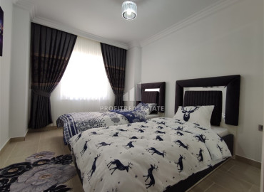 Luxury two bedroom apartment on the first coastline, overlooking the sea in Mahmutlar, Alanya ID-12038 фото-4