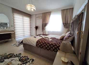 Luxury two bedroom apartment on the first coastline, overlooking the sea in Mahmutlar, Alanya ID-12038 фото-6