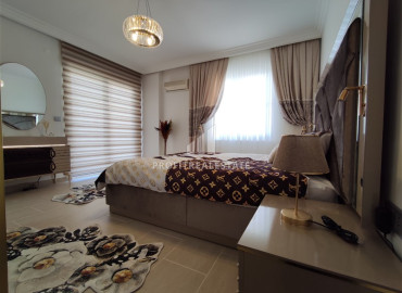 Luxury two bedroom apartment on the first coastline, overlooking the sea in Mahmutlar, Alanya ID-12038 фото-7