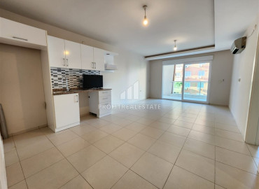 Двухкомнатная квартира 68 м2 без мебели, в 300 метрах от моря, в комплексе с наноструктурой в Махмутларе, Аланья ID-12047 фото-6