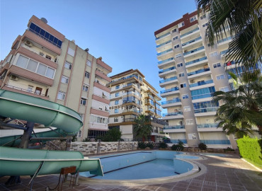 Ready-to-live-in one-bedroom apartment with a designer interior, 100 meters from the sea, in the center of Mahmutlar, Alanya ID-12048 фото-2