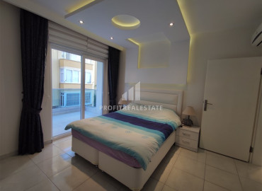 Ready-to-live-in one-bedroom apartment with a designer interior, 100 meters from the sea, in the center of Mahmutlar, Alanya ID-12048 фото-9