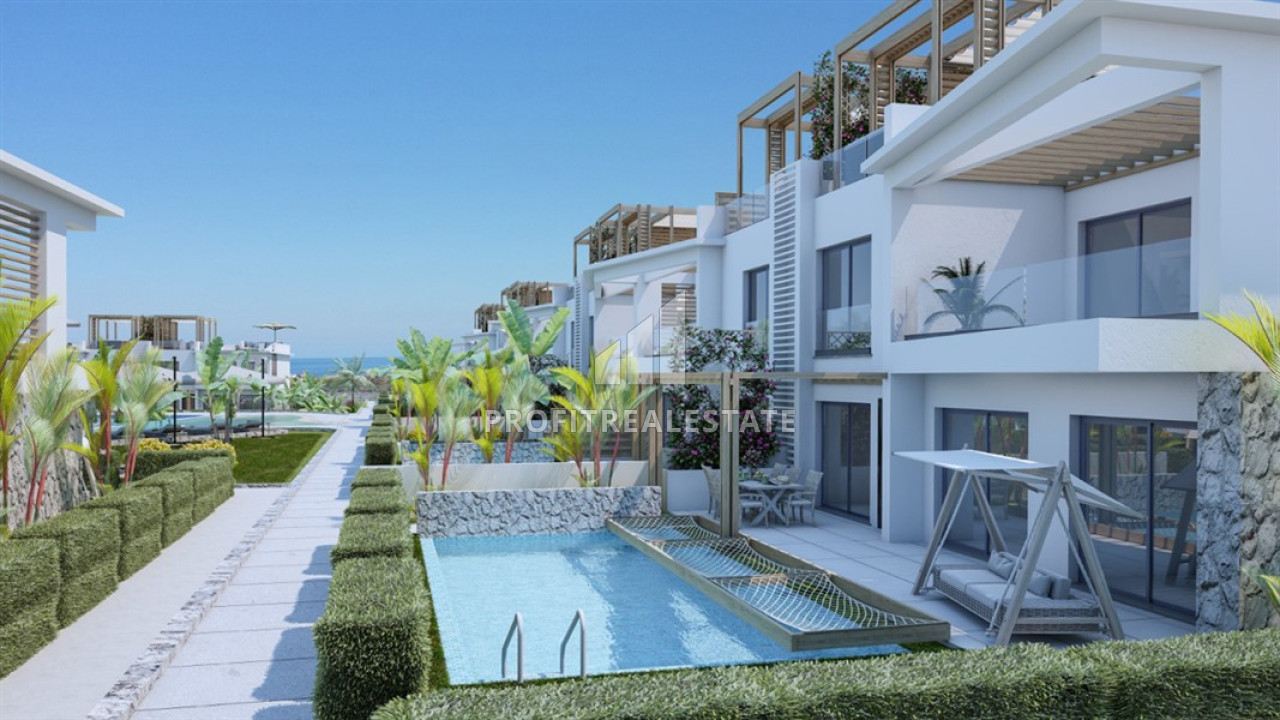 Привлекательный инвестиционный проект из двухуровневых апартаментов и квартир с выходом в сад в Эсентепе, Северный Кипр 121-156 м2 ID-12059 фото-1