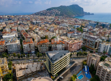 One-bedroom apartment in a new building, 350 meters from the sea, with a fine finish, unfurnished, in the center of Alanya ID-12064 фото-3