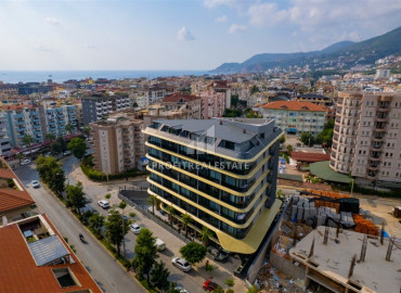 One-bedroom apartment in a new building, 350 meters from the sea, with a fine finish, unfurnished, in the center of Alanya ID-12064 фото-14