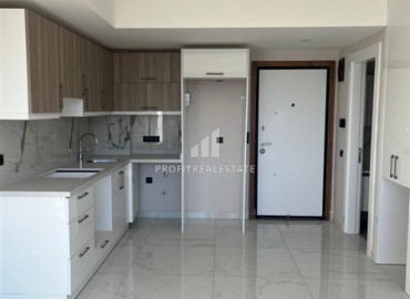 One-bedroom apartment in a new building, 350 meters from the sea, with a fine finish, unfurnished, in the center of Alanya ID-12064 фото-17