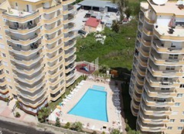 Two bedroom apartment, equipped with furniture and appliances in a cozy residential residence Mahmutlar, just 500 meters from the sea ID-12068 фото-1