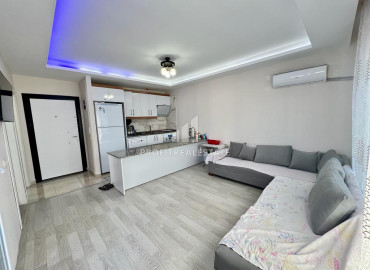 Квартира с одной спальней, 60м², в 400м от моря в районном центре Эрдемли, Арпачбахшиш ID-12069 фото-3