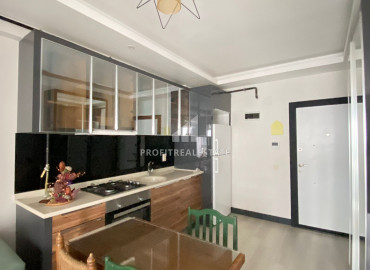 Газифицированные апартаменты с одной спальней, 60м², в доме городского типа в центре Мезитли, Мерсин ID-12070 фото-2