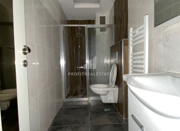 Газифицированные апартаменты с одной спальней, 60м², в доме городского типа в центре Мезитли, Мерсин ID-12070 фото-5