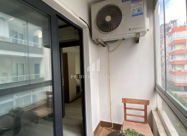 Газифицированные апартаменты с одной спальней, 60м², в доме городского типа в центре Мезитли, Мерсин ID-12070 фото-11