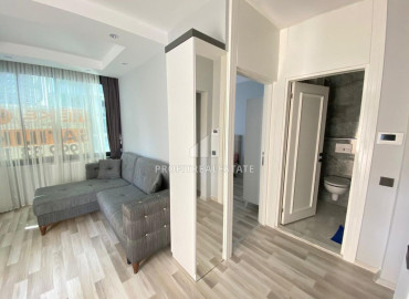Новая меблированная квартира с одной спальней, 55м², в центре Мерсина, в Мезитли по привлекательной цене ID-12076 фото-8
