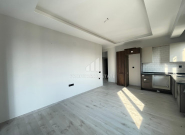 Новая квартира с двумя спальнями, 110м² с видом на море в газифицированном комплексе в Тедже, Мерсин ID-12128 фото-3