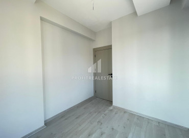 New apartment with two bedrooms, 110m² with sea views in a gasified residence in Tej, Mersin ID-12128 фото-11