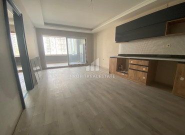 Apartment 1 + 1, 60m², in a residence with a swimming pool under construction in the Tomyuk area, Mersin ID-12133 фото-4