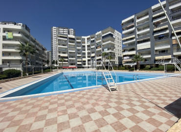Spacious two bedroom apartment, 110m², in a cozy residence with a swimming pool by the sea in Tej, Mersin ID-12134 фото-2
