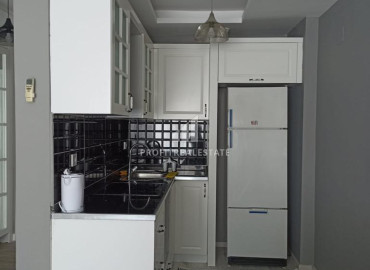 Меблированная двухкомнатная квартира, 55м², в новой резиденции в 200м от центра района Тедже, Мерсин ID-12136 фото-5