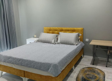 Меблированная двухкомнатная квартира, 55м², в новой резиденции в 200м от центра района Тедже, Мерсин ID-12136 фото-9
